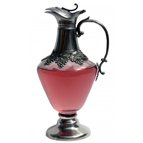 Serving decanter with grape decor, spout and base