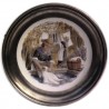 Pewter and faience plate with washerwoman decor