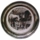 Pewter and faience plate with blacksmith decor