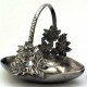 Small pewter basket with flower decor